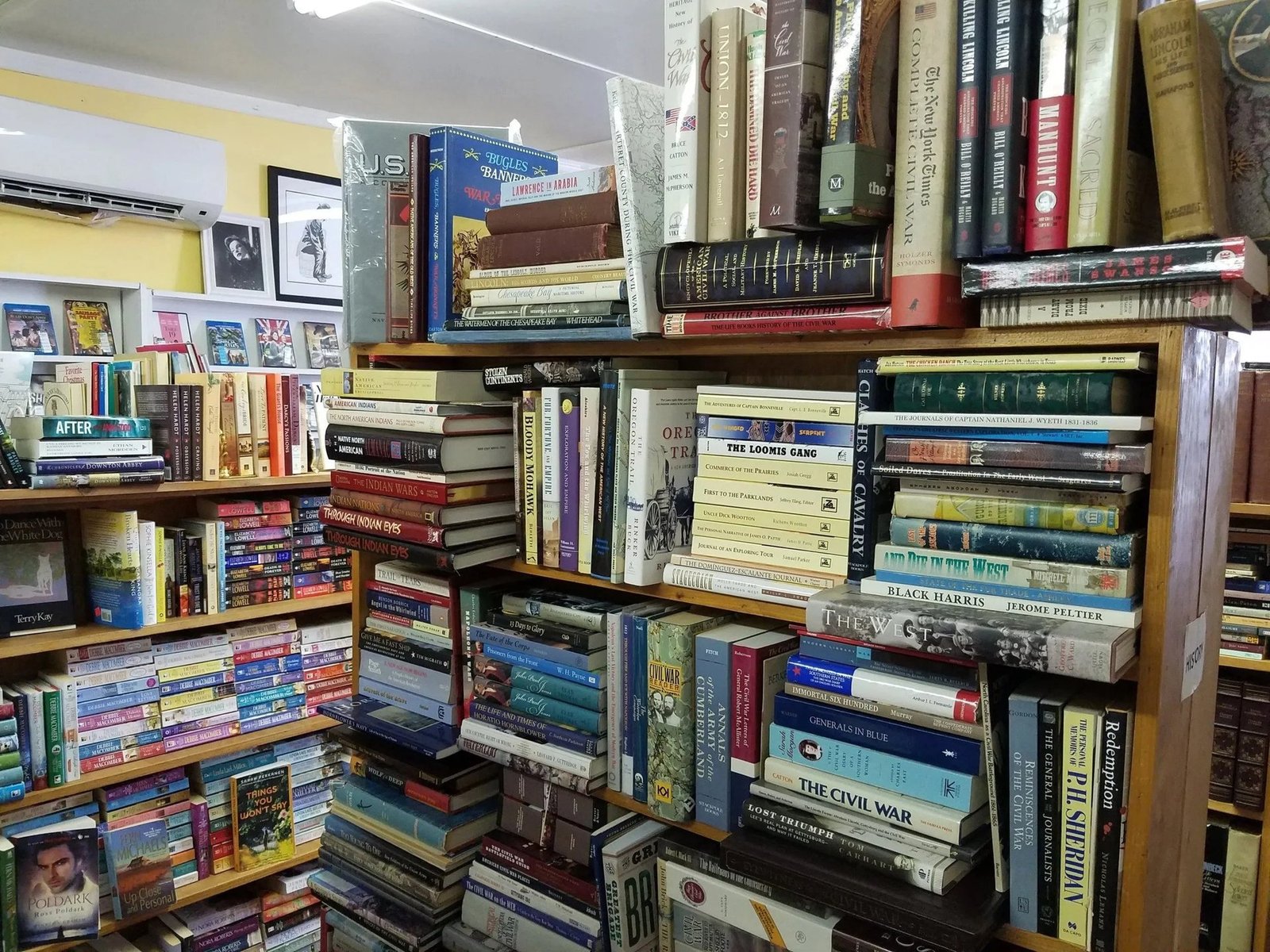Corner stacks of nonfiction hardcovers